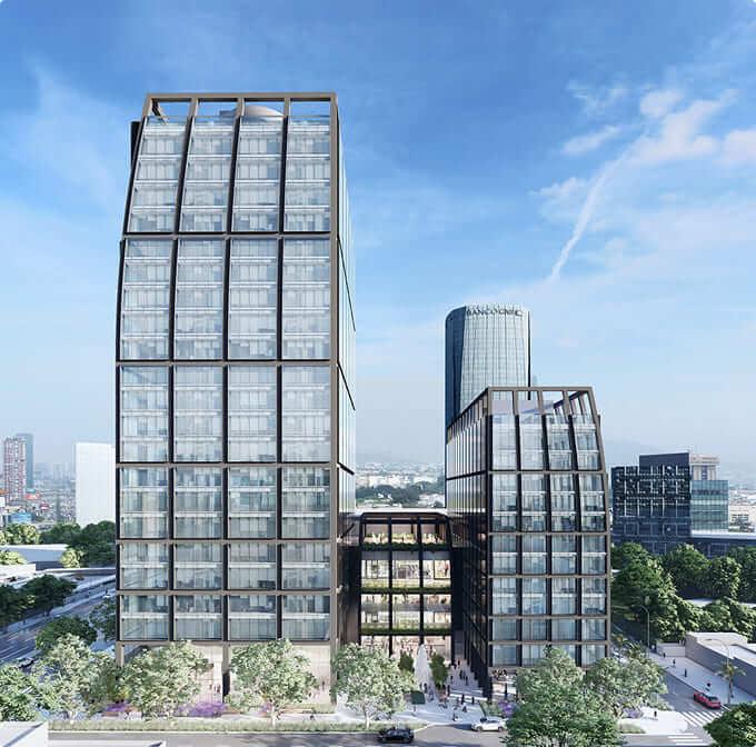Edificios modernos con diseño arquitectónico contemporáneo, rodeados de vegetación y espacio urbano. Ideal para oficinas.
